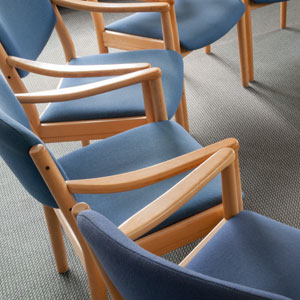 Circle of chairs in Wrexham group psychotherapy session